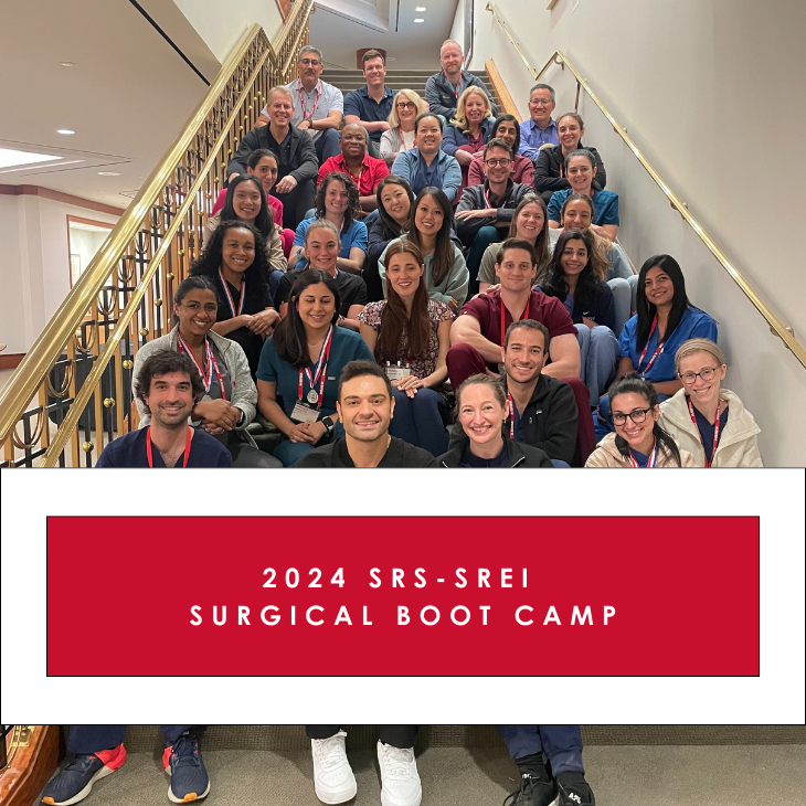 2024 SRS-SREI Surgical Boot Camp: Attendees sitting on stairs and smiling